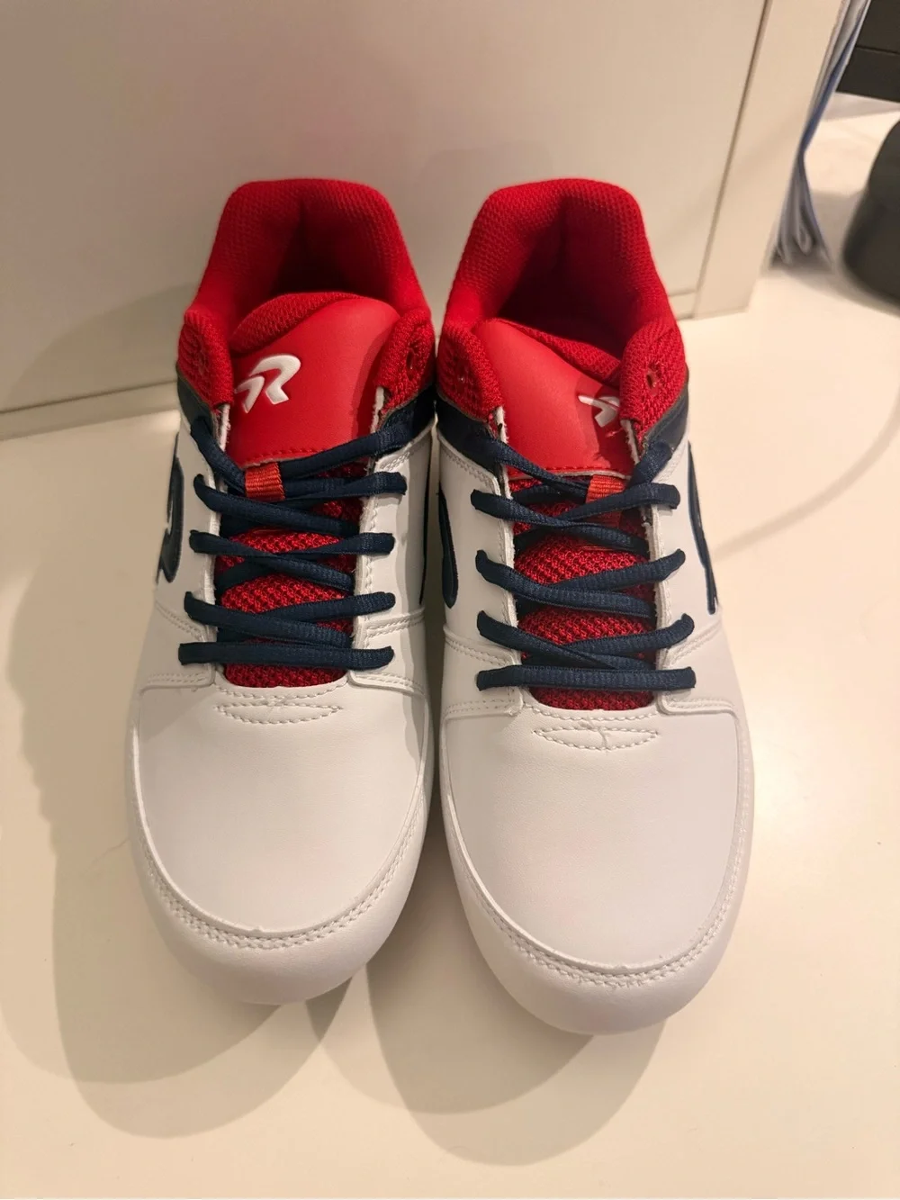 Women’s Red, White, and Blue Ringor Plastic Softball Cleats